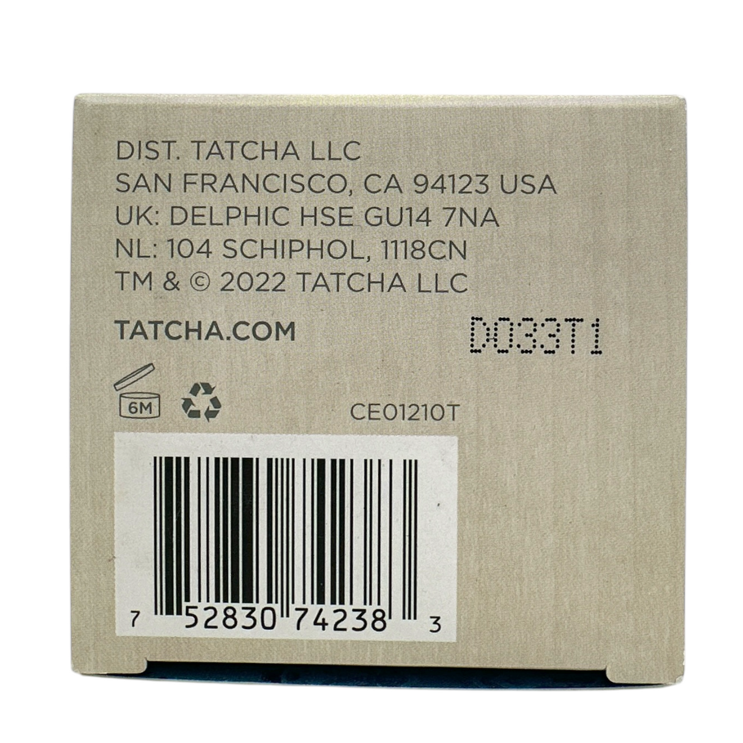 Tatcha The Essence Plumping Skin Softener with a beige label and a small decorative pattern on the lower right corner.